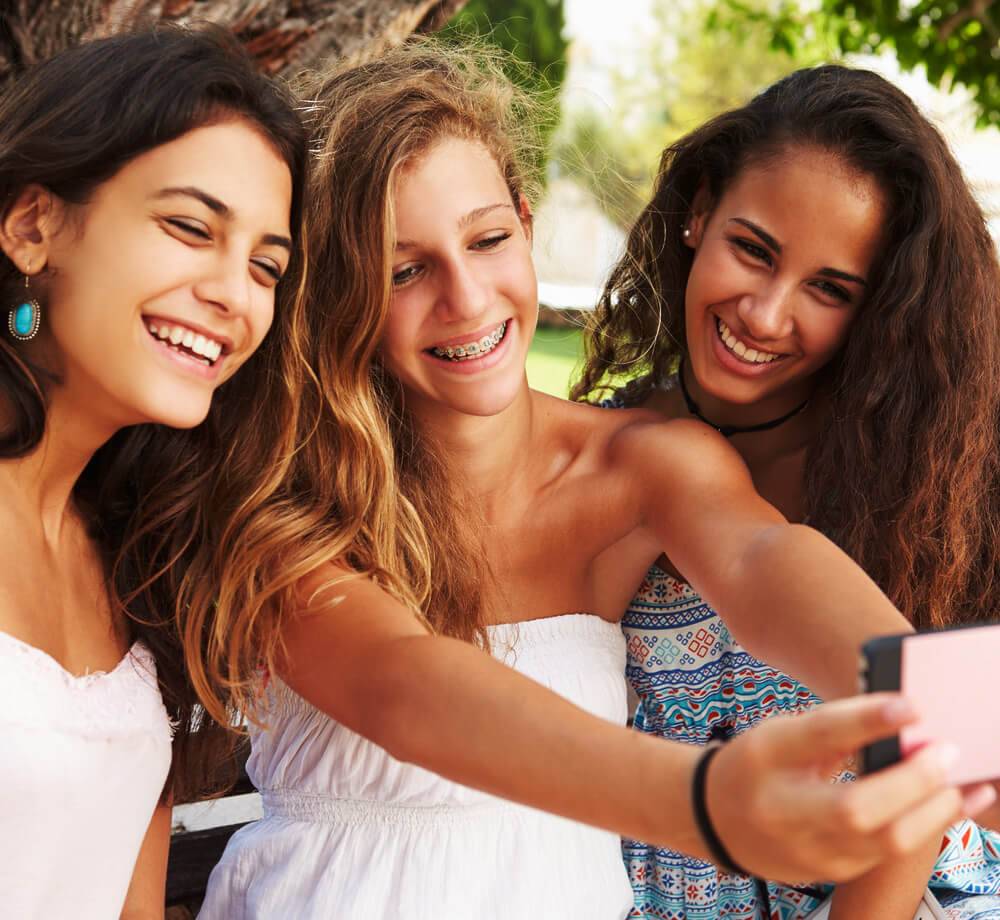 group of teens smiling